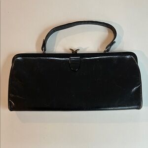 1950’s elegant black purse.  Timeless classic.